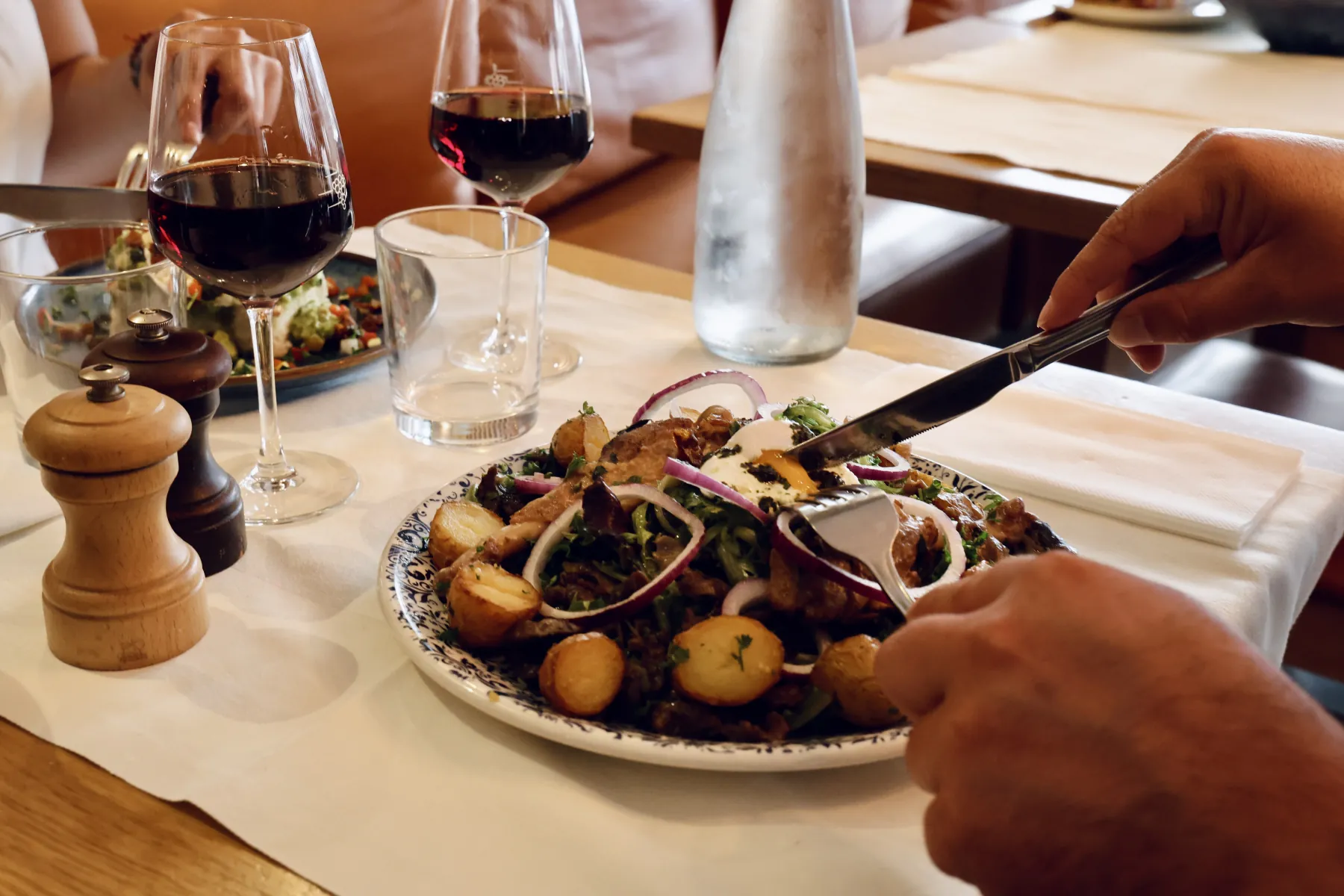A convivial lunch with red wine